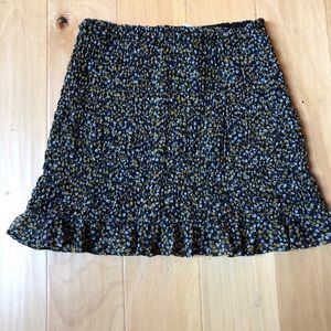 Black floral mini skirt